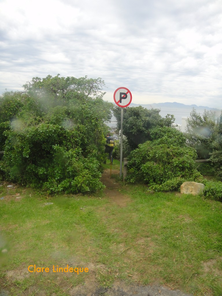 The path down to the entry point starts below the No Parking sign