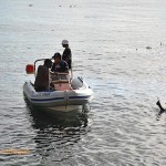 Discussions between boat crew and diver