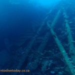 The Chrisoula K lying against the reef