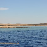 Shallow water where the reefs are is lighter in colour